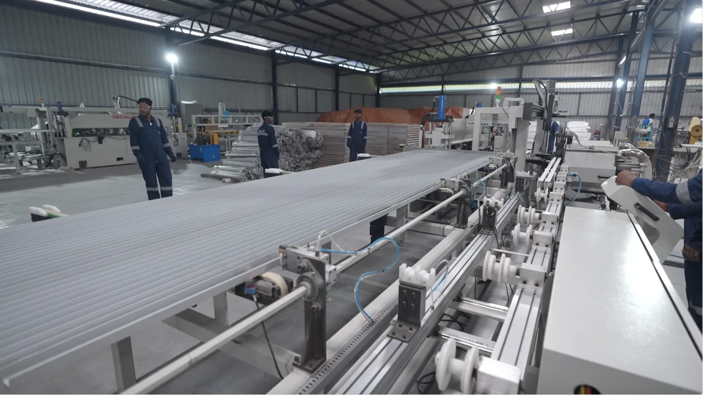 Sections on the automatic fabrication line, with operators at the machines