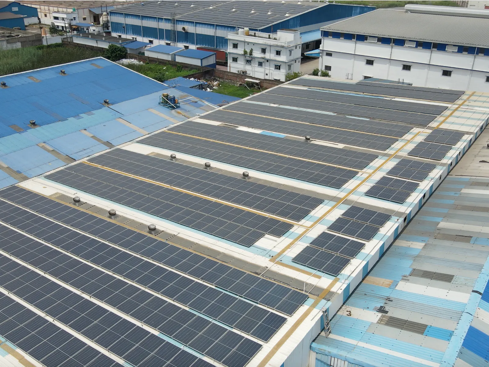 Rooftop solar panels across the La Reliant works