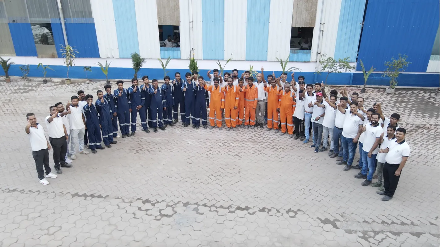 La Reliant employees assembled in the plant yard
