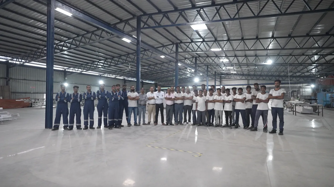Plant team assembled on the shop floor