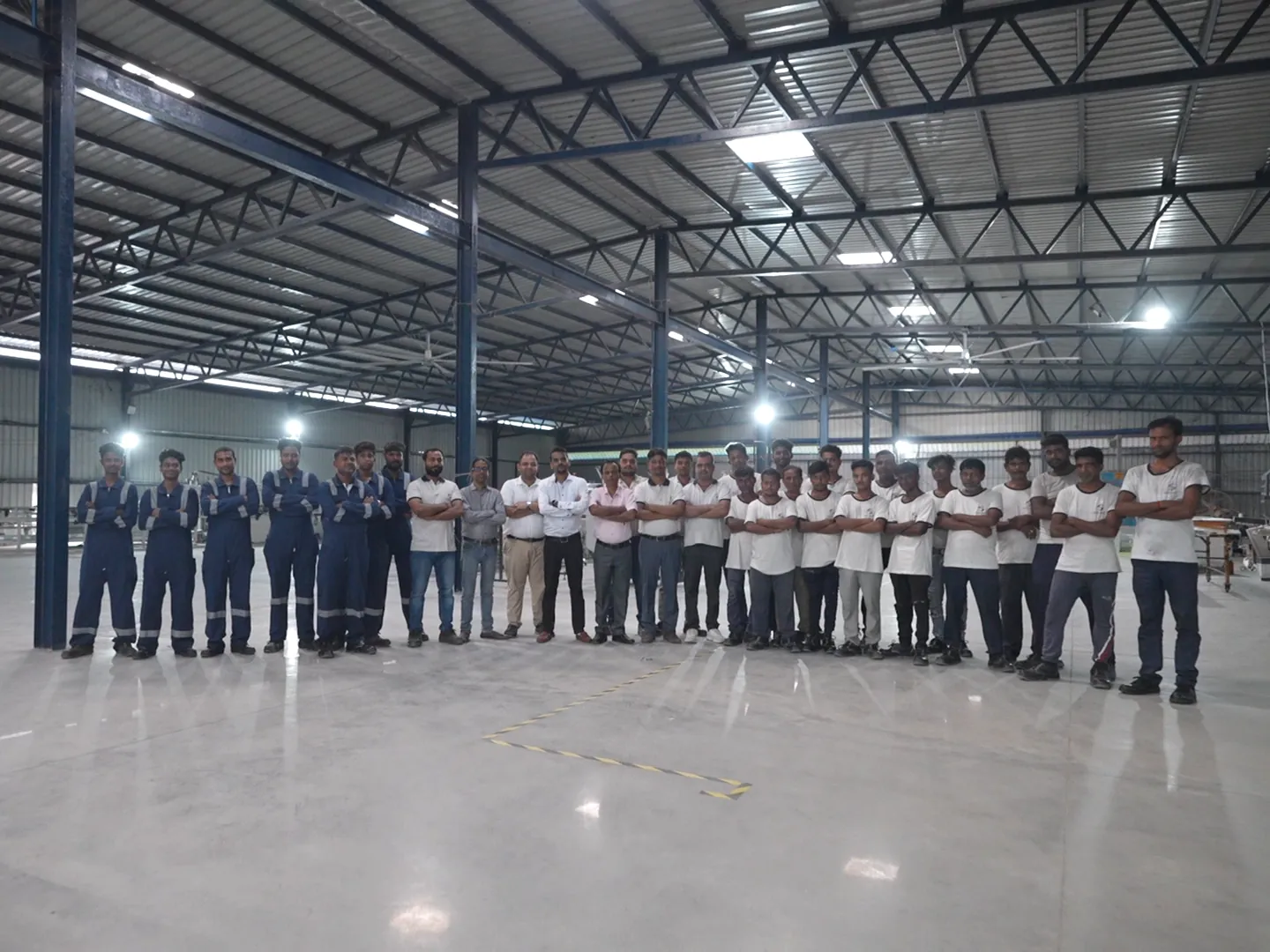 The La Reliant shop floor team in the plant hall
